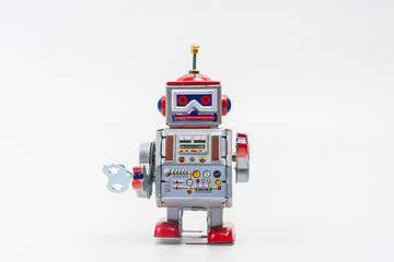 robot tin toy on white background