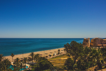 Fototapeta premium Beach. A sunny day on the beach of Fuengirola. Malaga province, Andalusia, Spain. Picture taken – 15 may 2018.