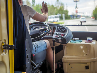 male bus driver in the paris city back view