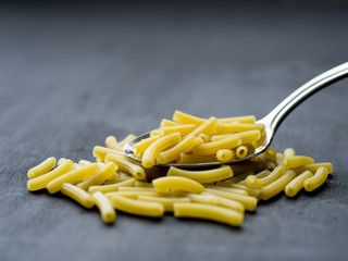 close-up pasta on spoon