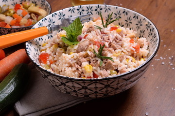 Bowl with rice salad and seasoning