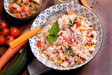 Bowl with rice salad and seasoning