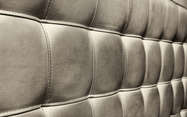 Tufted grey leather headboard texture for background