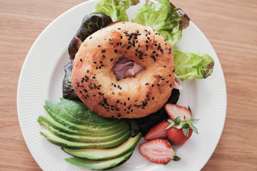 Low carb keto almond cheese bagel sandwich with avocado