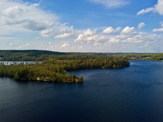 Fototapeta na wymiar Aerial view over lake and nature reserve in south Sweden