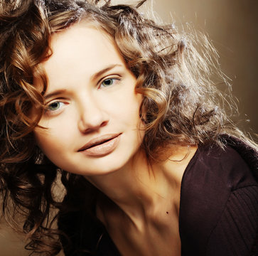 beautiful young woman with curly hair