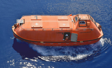 Offshore oil and gas platform test drive lifeboat. To ready at all times.
