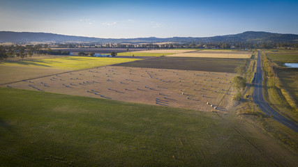 Fototapeta na wymiar Aerial drone view of hay bales in the Scenic Rim, Queensland, Australia