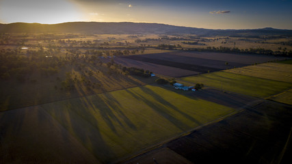 Fototapeta premium Aerial drone view of hay bales in the Scenic Rim, Queensland, Australia
