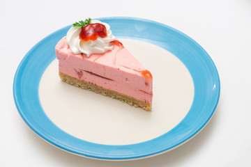 strawberry mousse cake with whipped cream topping
