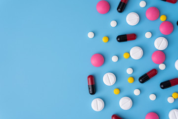 medicine  pills on blue background Copy space for text Assorted pharmaceutical Healthy Eating, Lifestyle