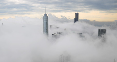 Fototapeta na wymiar Chicago downtown buildings skyline thick fog cloud
