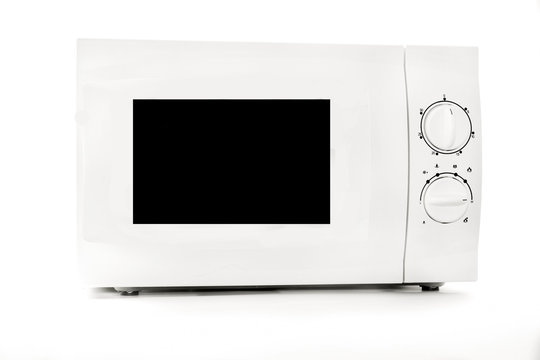 Microwave oven close up isolated on white background