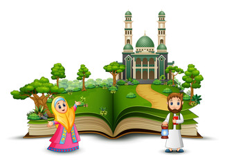 Happy Muslim family in front the mosque of an opened book