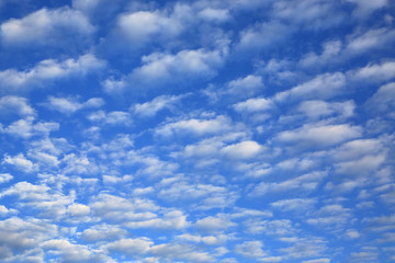 Sky and puffy clouds background.