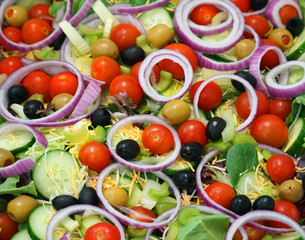 Obraz na płótnie Canvas fresh chopped vegetable salad as food background
