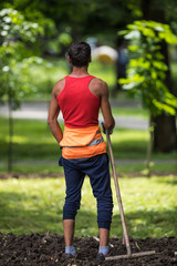 gardener with a rake