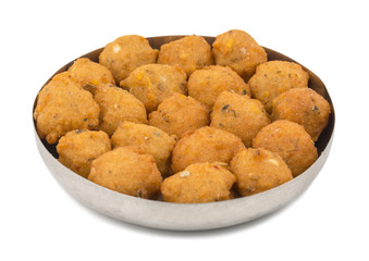 Indian Spicy Street Food Dal Vada Also Know as Moong Dal Vada, Pakoda, Pakode, Pakore, Moong Vada, Pakora or Bhajiya isolated on White Background