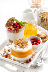 desserts with pumpkin, berries and biscuits, vertical