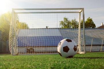 Football on a green field