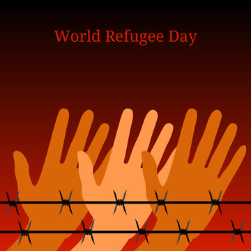 World Refugee Day. Hands behind barbed wire. Background symbolizes a fire at night