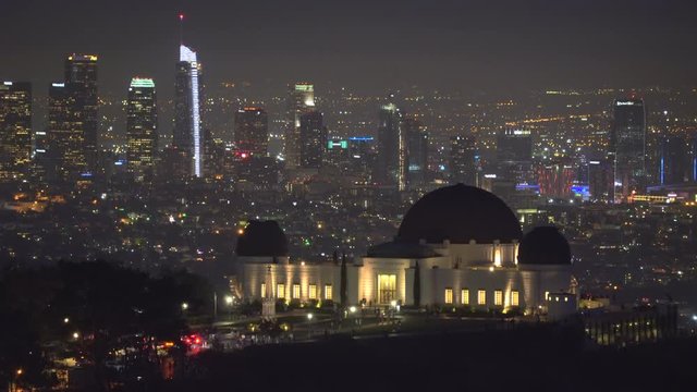 Griffith Observatory building and Los Angeles lights at night - August 2017: Los Angeles California, US