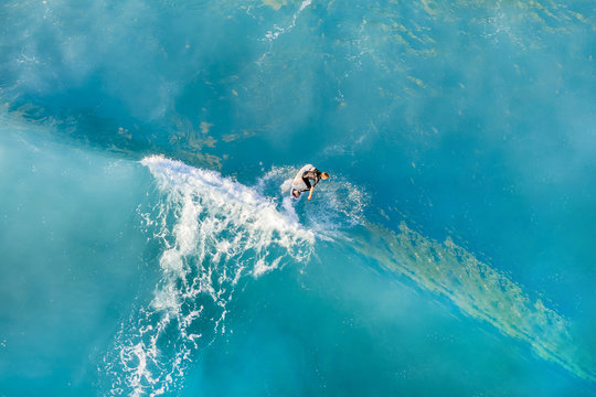 Top view of a surfer in the ocean