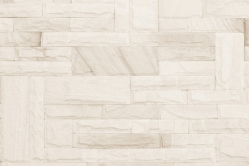 Brick wall art concrete stone texture background in wallpaper limestone abstract paint to flooring and homework/Brickwork or stonework clean grid uneven interior rock old.