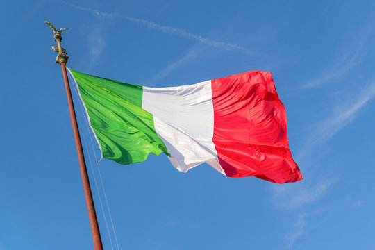 Flag of Italy against the blue sky