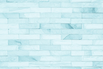 Naklejka premium Blue colors and white brick wall art concrete stone texture background in wallpaper limestone abstract paint to flooring and homework/Brickwork or stonework clean grid uneven interior rock old.