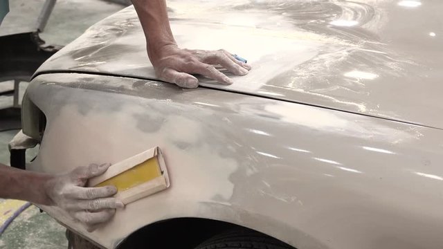 4K Garage Car body work car auto car repair car paint after the accident during the spraying automotive.	