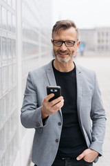 Businessman holding a mobile phone