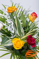 Bouquet of assorted multicolored roses isolated on white background