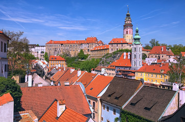 Fototapeta premium Cesky Krumlov, The Czech Republic: APRIL 29, 2017- Panorama of the Cesky Krumlov castle, historical part of Cesky Krumlov and Vltava river. Spring morning view. Czech Republic