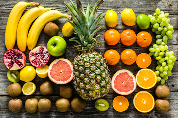 Tropical fruit mix on table. Fruits as healthy clean eating and dieting concept.