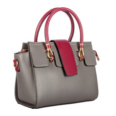 Fashionable gray classic ladies handbag of solid textured leather with a claret flap and inserts and gold accessories three-quarter view, isolated on a white background