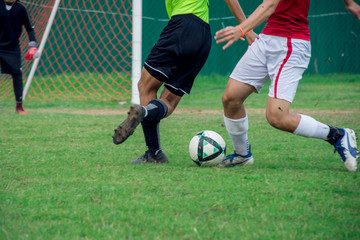 Obraz premium Two guys fighting for the ball