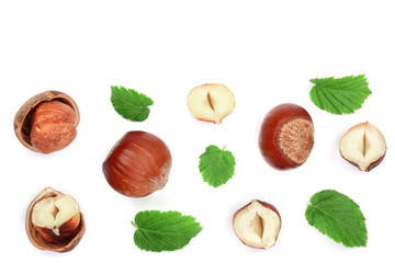 Hazelnuts with leaves with copy space for your text isolated on white background. Top view. Flat lay