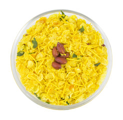 Indian Traditional Spicy And Sweet Mixture Namkeen Also Know as Chivda, Farsan, Namkin, Chiwada, Karanji, Nimco or Nimko Made of Gram Flour And Mixed With Dry Fruits. isolated on White Background