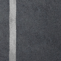 Asphalt road with separation line. Road texture