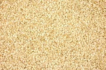 White sesame seeds background