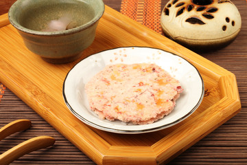 Sakura senbei and sakura tea on a tray