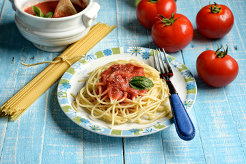 spaghetti with tomato sauce and parmesan cheese - traditional italian recipe