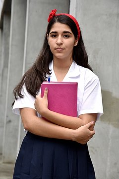 Serious Catholic Colombian Girl Student Wearing Uniform