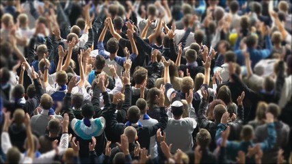 Excited crowd of sports fans applauding, waiting for their team's victory. Crowd of sports fans watching game at stadium, slow motion