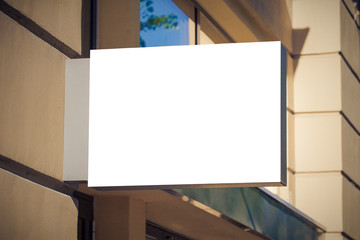 Mock up. Empty signboard of store or restaurant on the wall