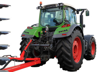 Obraz premium Tractor with attached plow in transport position.