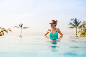 Woman in luxury tropical resort
