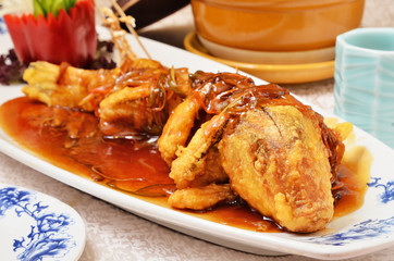    Deep-fried five sliced ingredients(lilies, sour shoots, black fungus, carrots, mushrooms) with sweet and sour fish              