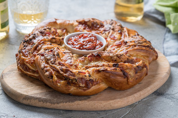 Freshly baked pizza wreath.